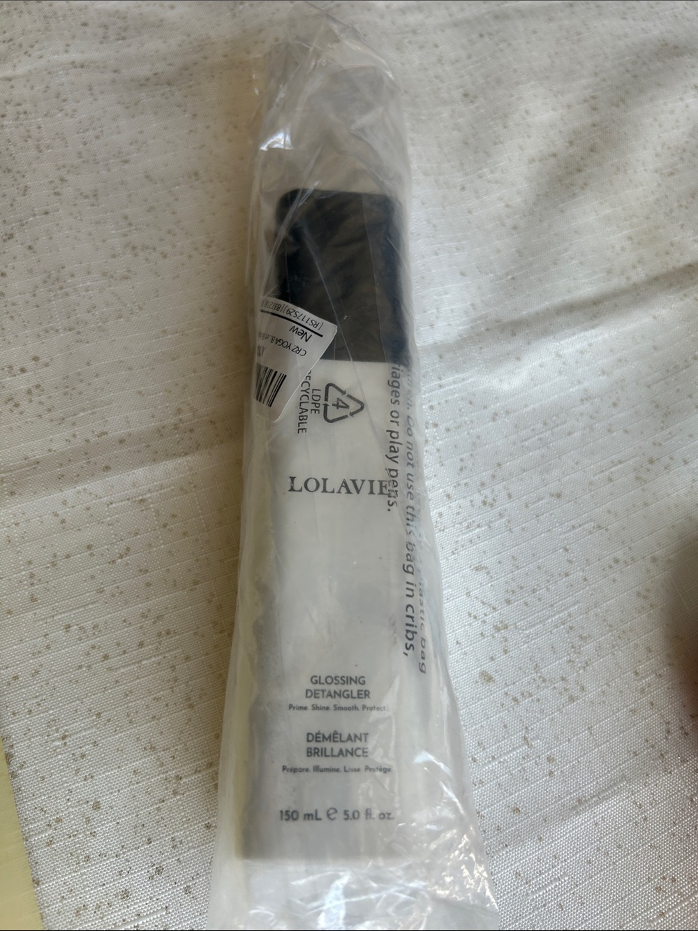 LOLAVIE Glossing Detangler in White and Black 150ml
